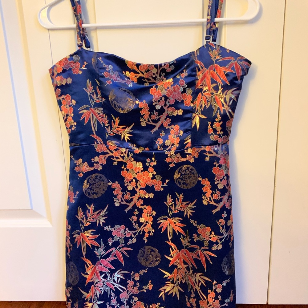 Blue satin mini dress with cool floral pattern